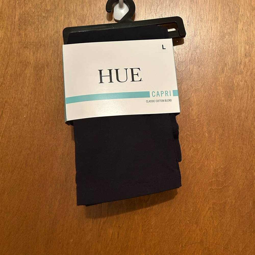 NEW! Navy blue capri leggings size L Still in packaging.